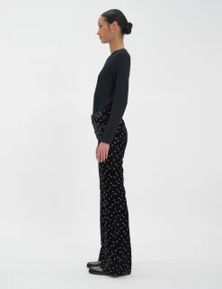 Shop Ines de la Fressange Paris Charlotte trousers in smooth black velvet with gold print