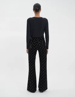 Shop Ines de la Fressange Paris Charlotte trousers in smooth black velvet with gold print