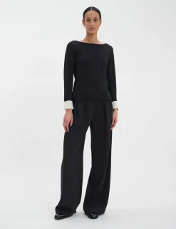 Shop Ines de la Fressange Paris Gigi jumper in black merino wool, white cuffs