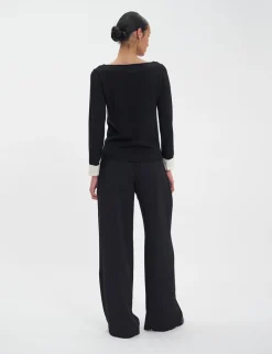 Shop Ines de la Fressange Paris Gigi jumper in black merino wool, white cuffs