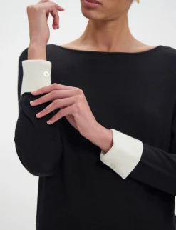 Shop Ines de la Fressange Paris Gigi jumper in black merino wool, white cuffs